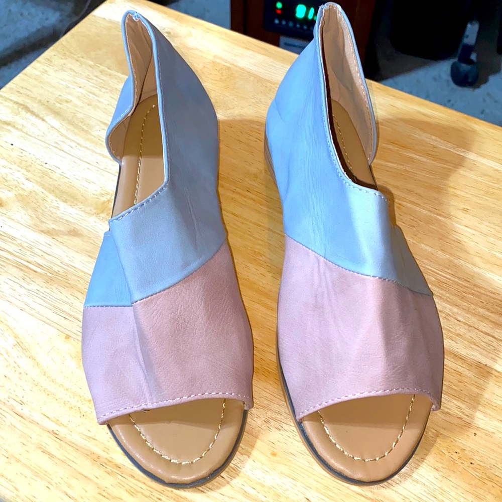 Never used sandals. Size 7.5